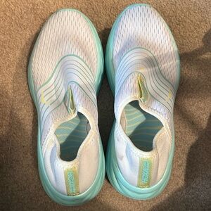 Hoka sneakers white with teal sole and stripping. Sz 8 woman’s